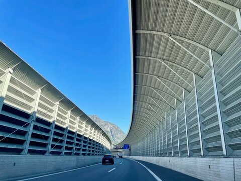 Bissone, Switzerland, 19.04.2022. Swiss highway with noise barrier.