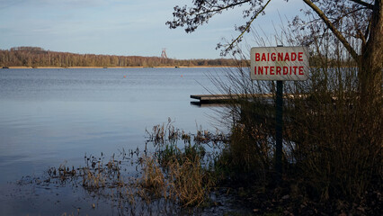 Bathing prohibited in a lake in the middle of nature 