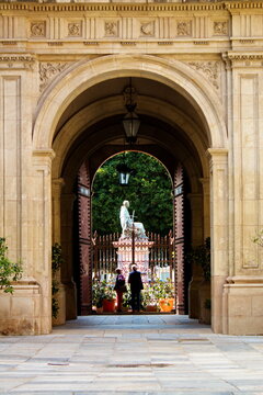Statue of Cardinal Belluga located in the Plaza Glorieta in the city of Murcia, seen from inside the Episcopal Palace