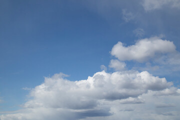 Blue sky background with clouds.Beautiful summer sky.