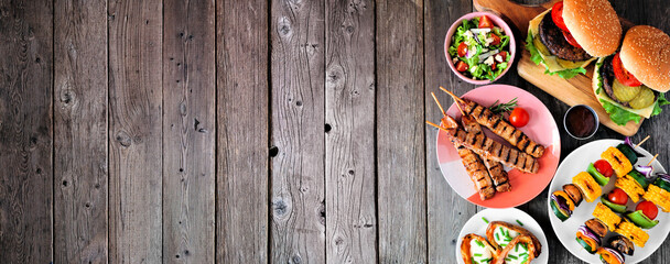 Summer BBQ or picnic food side border. Selection of burgers, grilled meat, vegetables, fruits,...