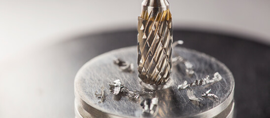 Milling сutter and drill bit make sink in hole in steel billet. Locksmith work.
