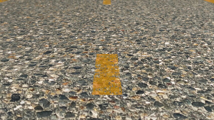 Structure of the asphalt, road marking. Close-up of animated road for the movement of vehicles, a dark cover the carriageway road markings - white stripes. Asphalt highway with yellow markings lines - obrazy, fototapety, plakaty