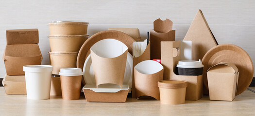 Paper eco-friendly disposable tableware. A large set of dishes and packaging for fast food....