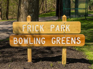 The Frick Park Bowling Greens sign in Frick Park, a city owned park in Pittsburgh, Pennsylvania,...