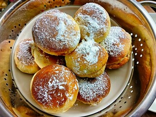 Delicious donuts with powdered sugar
