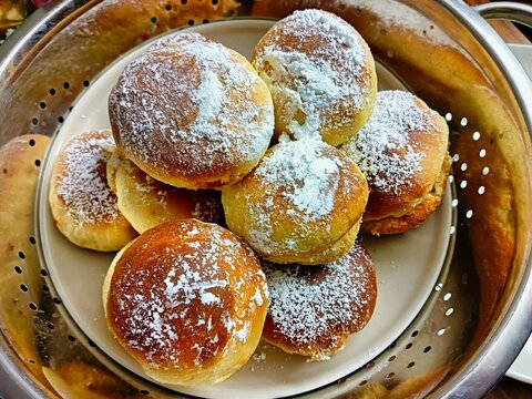 Delicious donuts with powdered sugar