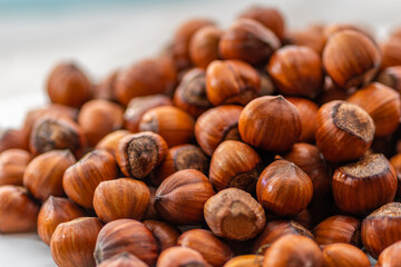 Hazelnuts in the shell. Round filbert, ripe fruit of a Corylus avellana hazel shrubs.