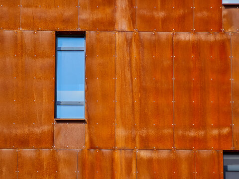 Building facade made of steel sheets. Corten steel