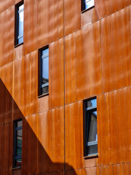 Building facade made of steel sheets. Corten steel