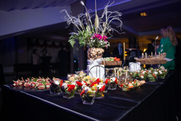 Fototapeta na wymiar Snacks at the buffet in a cup . catering at the event.