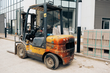 forklift on work. loading of building materials