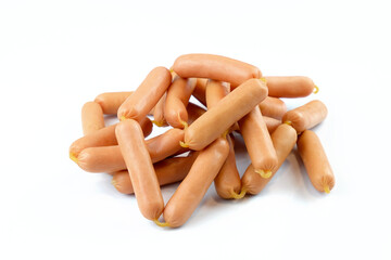 Small thin sausages on a white background. Chicken sausages in a natural casing. Sausages with chicken and turkey meat.