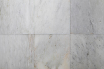 Fancy luxurious Italian Carrara marble tiles background design element with copy space.
