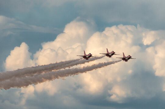 Avalon, Australia - February 21, 2015: Republic of Singapore Air Force (RSAF) Lockheed Martin F-16CJ Fighting Falcon fighter aircraft of the Black Knights display team flying in formation.