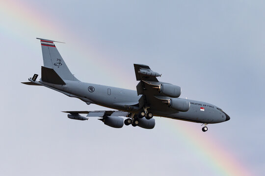 Avalon, Australia - February 21, 2015: Republic of Singapore Air Force (RSAF) Boeing KC-135R aerial refueling aircraft on approach to land with a rainbow in the background.