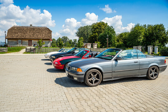 Wiaczemin Polski, Poland - August 12, 2021. Four vintage convertible cars on roadtrip in Summer