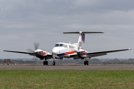 Avalon, Australia - February 26, 2015: Ambulance Victoria Hawker Beechcraft B200C King Air Air Ambulance aircraft VH-VAE arriving at Avalon Airport.