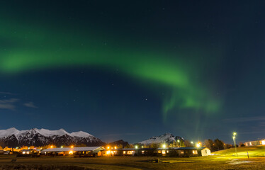 Naklejka na ściany i meble Beautiful northern lights in the wonderful evening of South Iceland