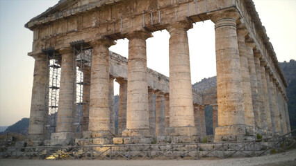 Restoration of Acropolis of world historical heritage. Action. Antique columns of dilapidated Acropolis on sky background. Beautiful architecture with columns of Acropolis of ancient Europe