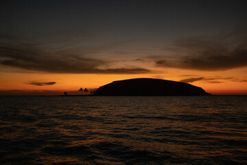 Naklejka na ściany i meble Sunset at the Abrolhos archipelago in Bahia, Brazil