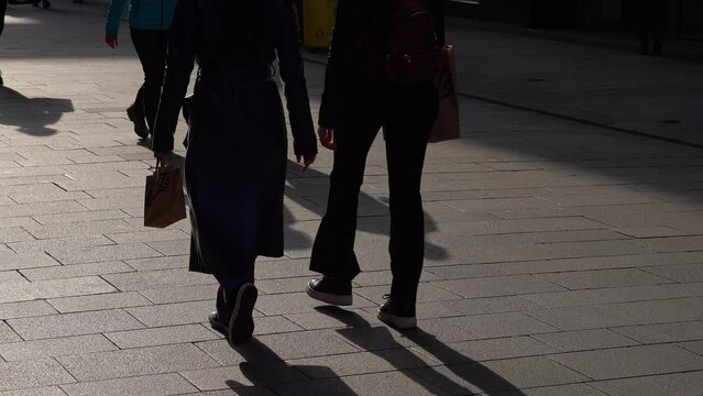 Shadows of people walking through the streets - Ireland travel photography