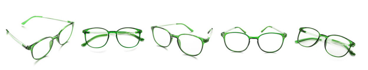 Set of modern green eyeglasses isolated on white