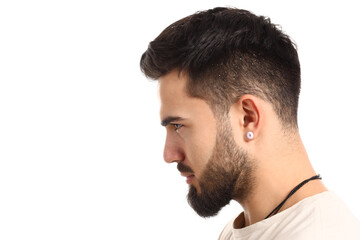 Young man with problem of dandruff on white background