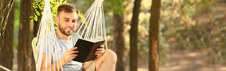 Young man reading book and relaxing in hammock outdoors