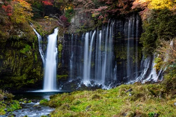Fotobehang waterfall in autumn © worm_ flag