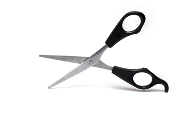 Closeup hairdresser scissors cutting hair white background