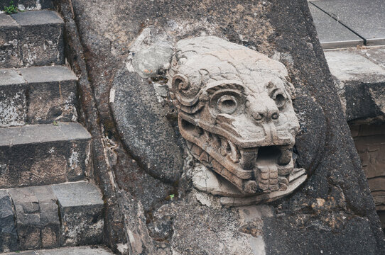 Stone carving details at the Temple of Quetzalcoatl (the Feathered Serpent) at Teotihuacan an ancient city and a vast archeological site in Central Mexico.