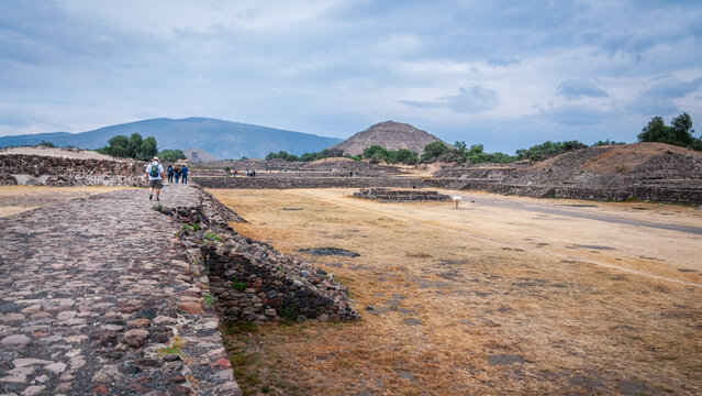 Avenue of the Dead at Teotihuacán, an ancient per-Columbian city and vast archeological site in Central Mexico. It links the Temple of Quetzalcoatl, the Pyramid of the Moon and the Pyramid of the Sun.