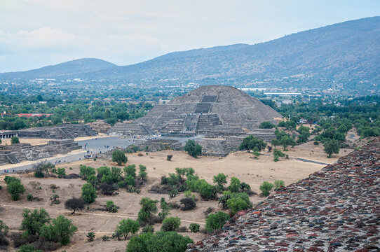 Perspective looking at the Pyramid of the Moon, at Teotihuacan, an ancient pre-Aztec City and archeological site in Central Mexico. View from the direction of the Pyramid of the Sun.