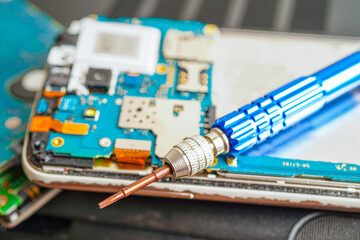Repairing and upgrade mobile phone, electronic, computer hardware and technology concept.