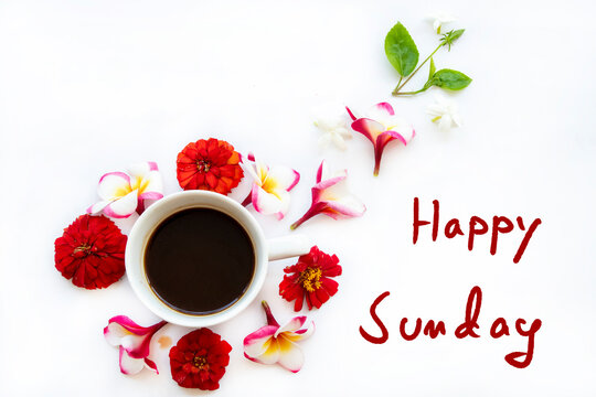 happy sunday message handwriting with hot coffee, colorful flowers arrangement flat lay postcard style on background white