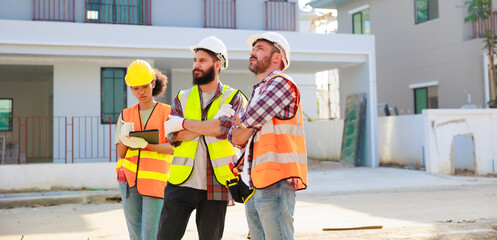 Professional Mechanical Engineer team wearing safety hard hat helmet working in  manufacturing...