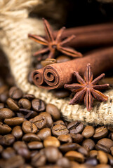 Coffee on the roasted coffee beans background