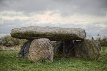 Dramatic shot of megalithic tomb Teufelskeller (lit. devils cellar) near Drosa in Germany