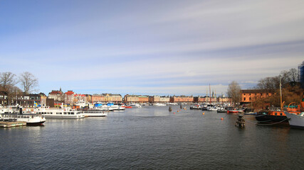 Naklejka premium View on a canal with many boats at Skeppsholmen in the city of Stockholm