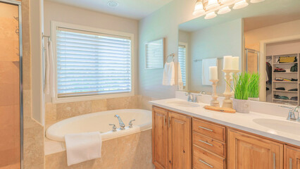 Fototapeta na wymiar Panorama Traditional contemporary master bathroom interior with window