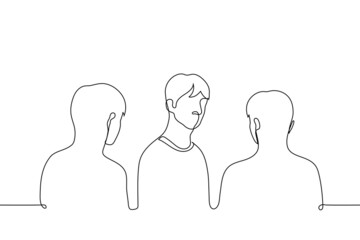 man stands looking at the viewer he turned around while others stand with their backs and look at him - one line drawing vector. concept to change your mind, change your mind, suspect
