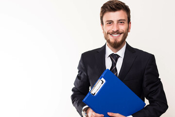 Young Businessman Holding Documents 