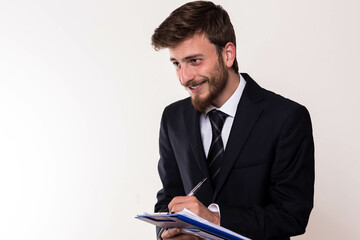 Young Businessman Holding Documents and Smiling