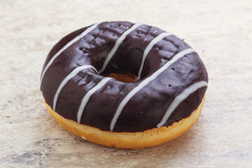Glazed sweet tasty chocolate donut