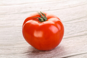 Red ripe big tomato isolated