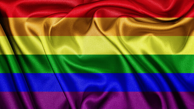 Close up realistic texture fabric rainbow textile silk satin flag of LGBT Pride waving fluttering background. Lesbian, gay, bisexual, transgender organization community symbol colors
