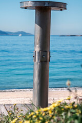 beach with showers and wooden walkway in galicia, spain