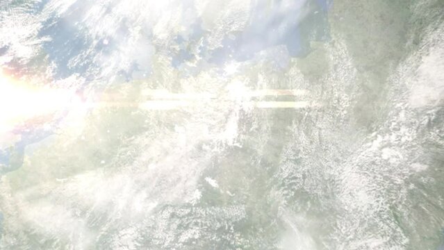 Earth zoom in from outer space to city. Zooming on Cottbus, Germany. The animation continues by zoom out through clouds and atmosphere into space. Images from NASA