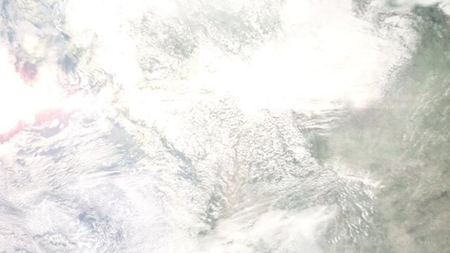Earth zoom in from outer space to city. Zooming on Kamloops, British Columbia, Canada. The animation continues by zoom out through clouds and atmosphere into space. Images from NASA